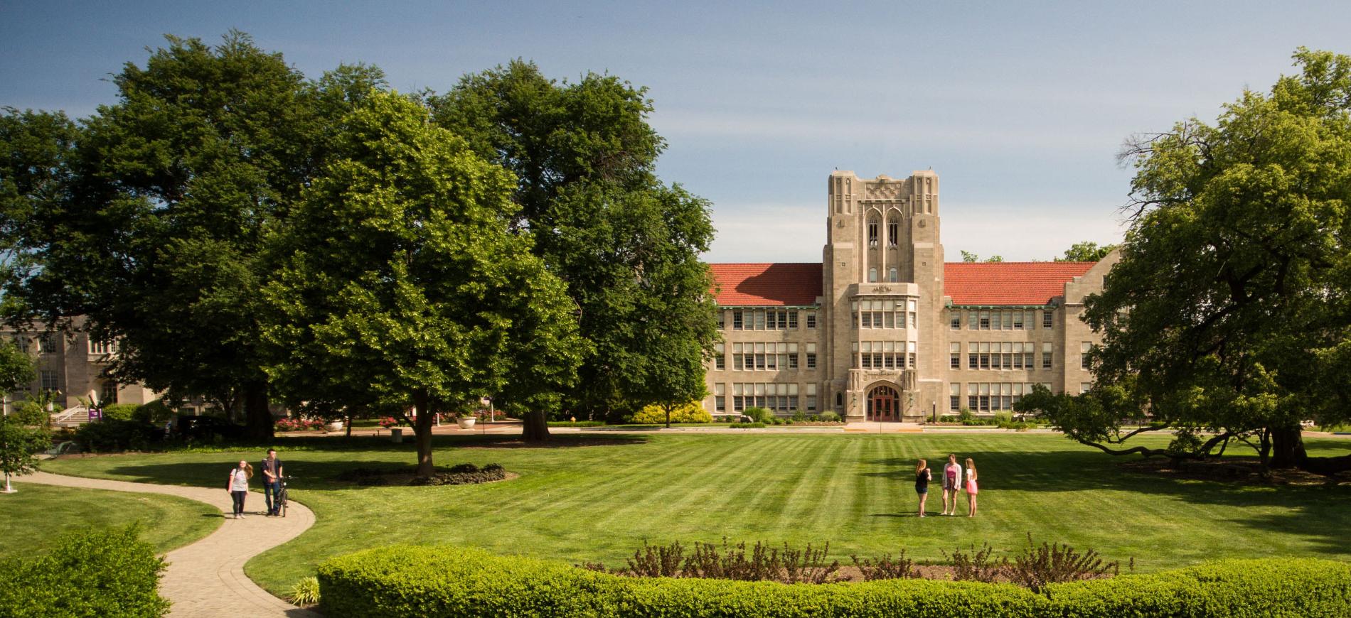 Campus front oval in summer with students